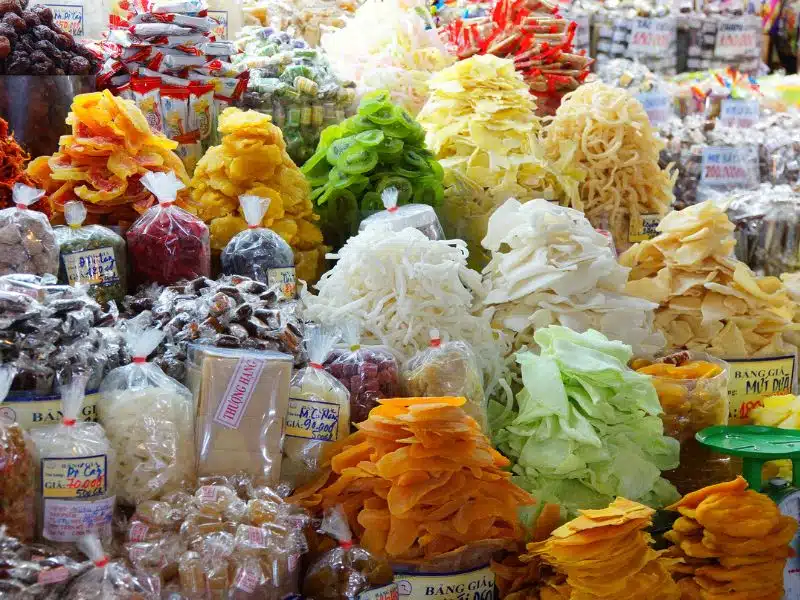 Mounds of dried fruits in a local Vietnamese market