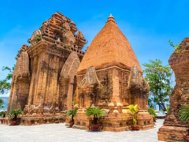 Three ruined red brick structures of Ponagar Tower in Nha Trang