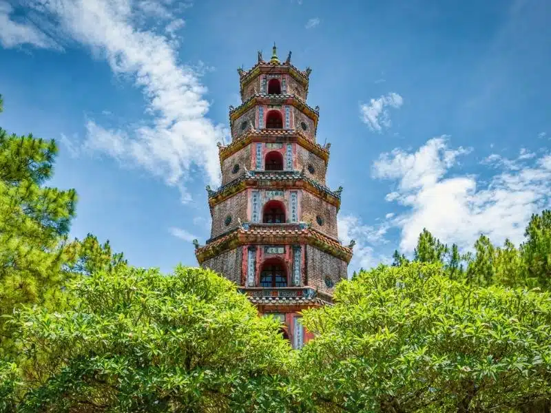 Famous 7 storey tower of Thien Mu Pagoda poking out from the trees