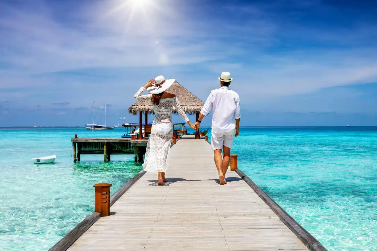 barefoot, beach, beautiful, blue, couple, elegant, exotic, female, fun, girlfriend, happiness, hat, holding hands, holiday, honeymoon, jetty, leisure, lifestyle, love, luxury, maldives, male, man, nature, ocean, paradise, people, pier, relaxation, resort, romance, romantic, sand, sea, sky, summer, together, tourism, travel, travelling, tropical, turquoise, two, vacation, walking, water, white, woman, wooden, young